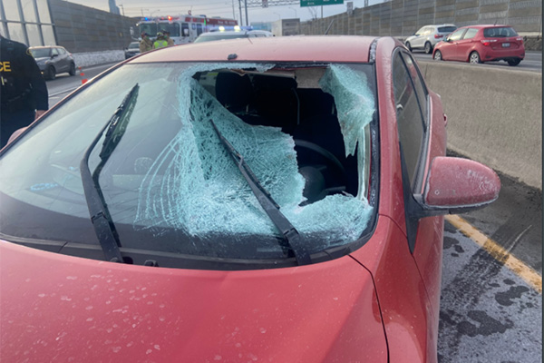 Ice sheet causes serious damage to driver and windshield